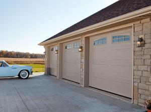 3 traditional garage doors with windows