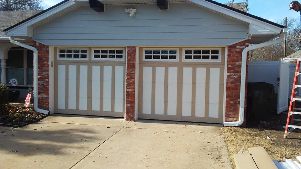 2 carriage garage doors with a tan overlay 